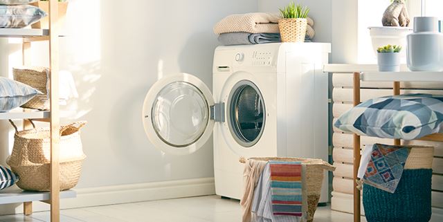 Sunny laundry room with washing machine