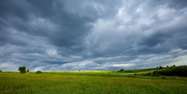 Stormy clouds over a field
