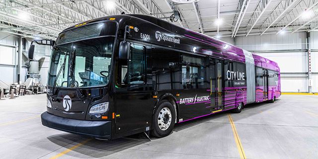 Purple battery electric STA bus in the station